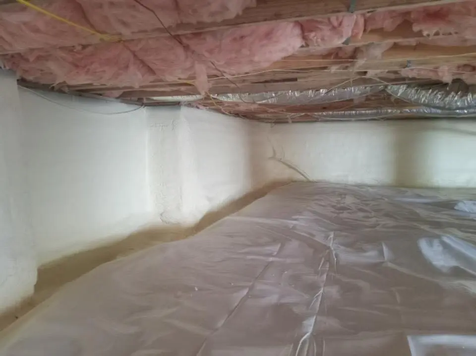 Crawl space encapsulation with closed-cell spray foam for Commercial Roof Restoration in East Allen